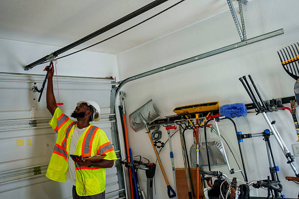 Professional Garage Door Maintenance technician working in Center Point, TX